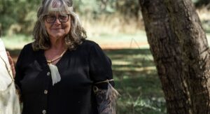 Aunty Jo wearing emu feathers