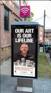 Advertisement showing Uncle Mick saying Art is our lifeline
