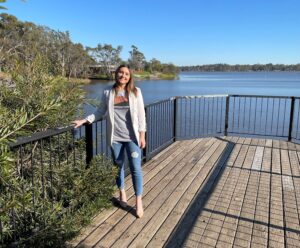 Bonnie standing besides the Nagambie lake
