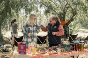 Taungurung guide and guest sharing a cuppa