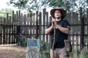 Jonah holding digging stick