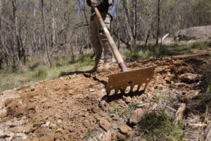 BIIK raking the soil